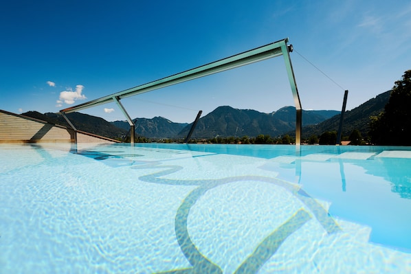 Outdoor pool, open 8:00 AM to 8:00 PM, sun loungers