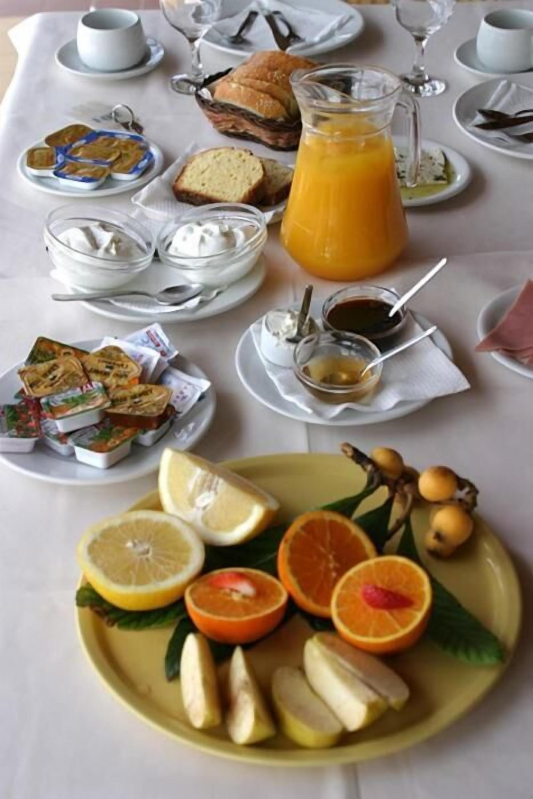 breakfast, dinner served; greek cuisine, al fresco dining