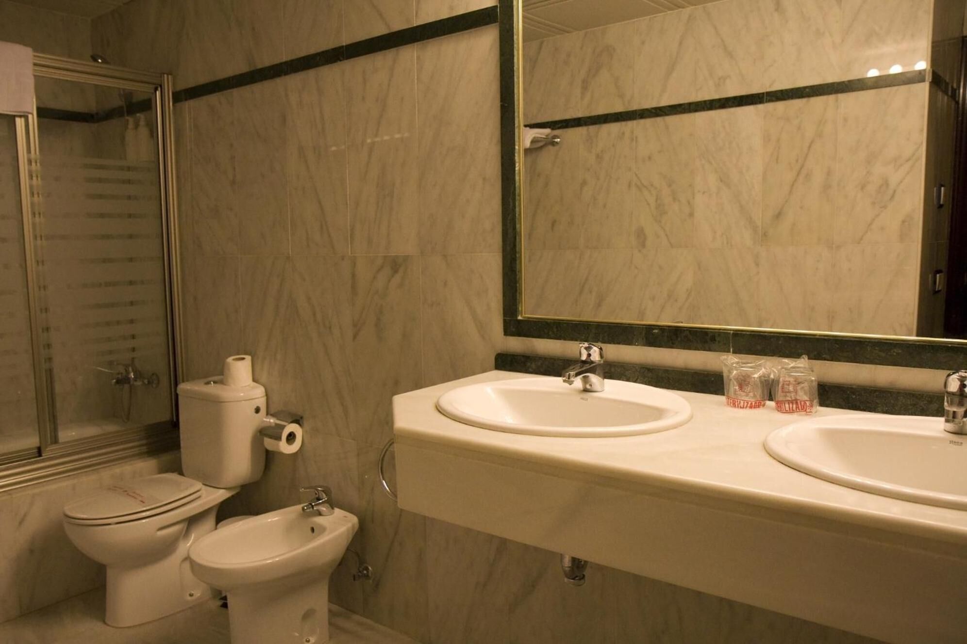 bathtub, free toiletries, hair dryer, towels