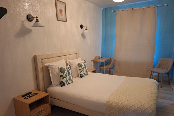 Blackout drapes, soundproofing, iron/ironing board (on request)