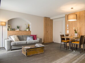 Grand Apartment, 2 Bedrooms (Sassalbo) | Living area | Flat-screen TV