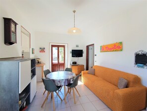 Apartment, 1 Bedroom | Living area | 36-inch flat-screen TV with cable channels, TV - La Maggiolina (Baveno)