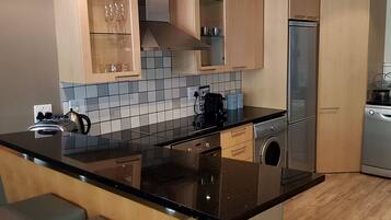 Luxury Apartment, 2 Bedrooms, Balcony | Private kitchen | Full-size fridge, microwave, oven, stovetop