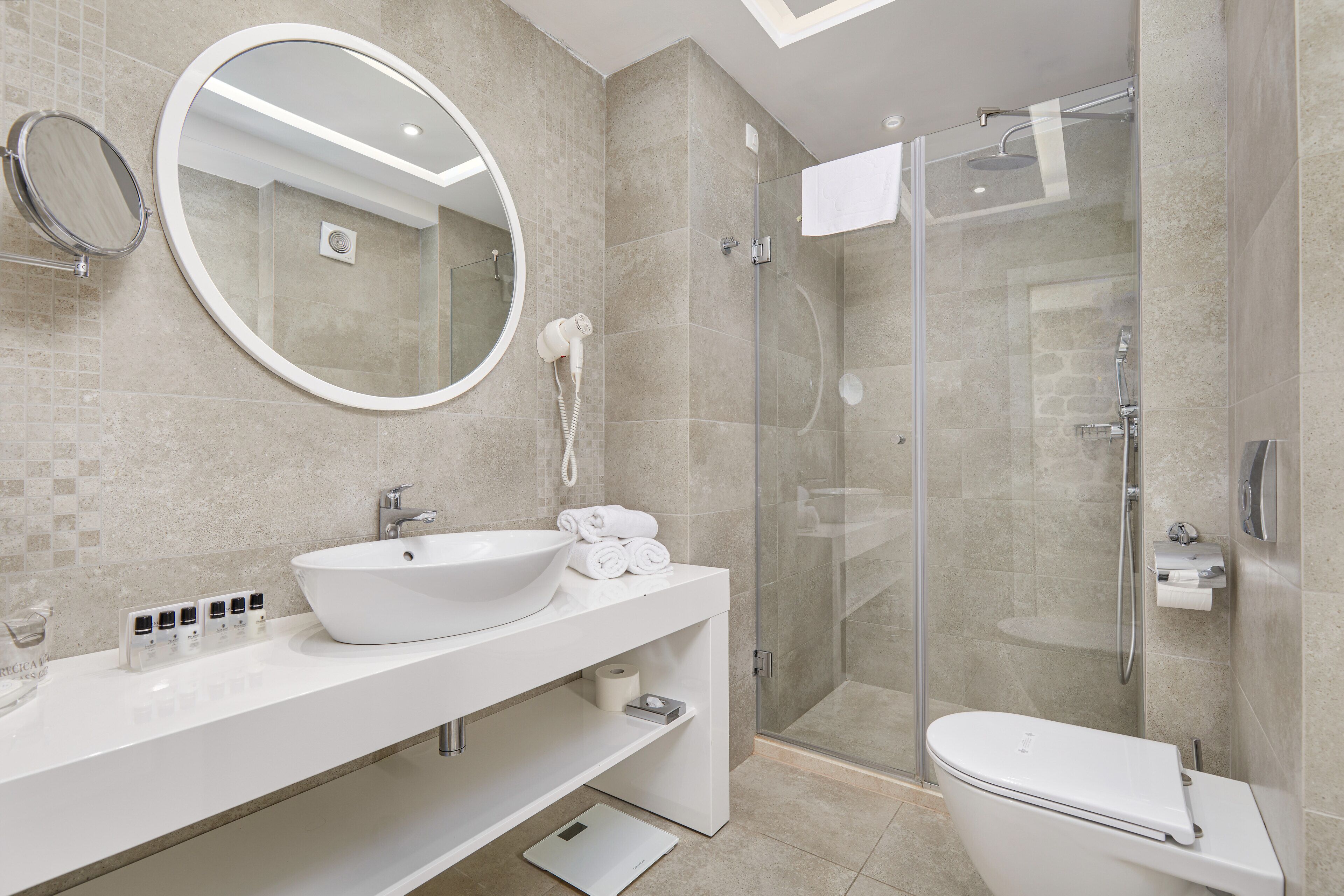 shower, free toiletries, hair dryer, bathrobes