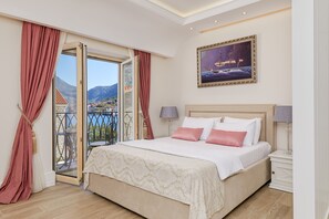 高档床上用品、迷你吧、客房内保险箱、办公桌