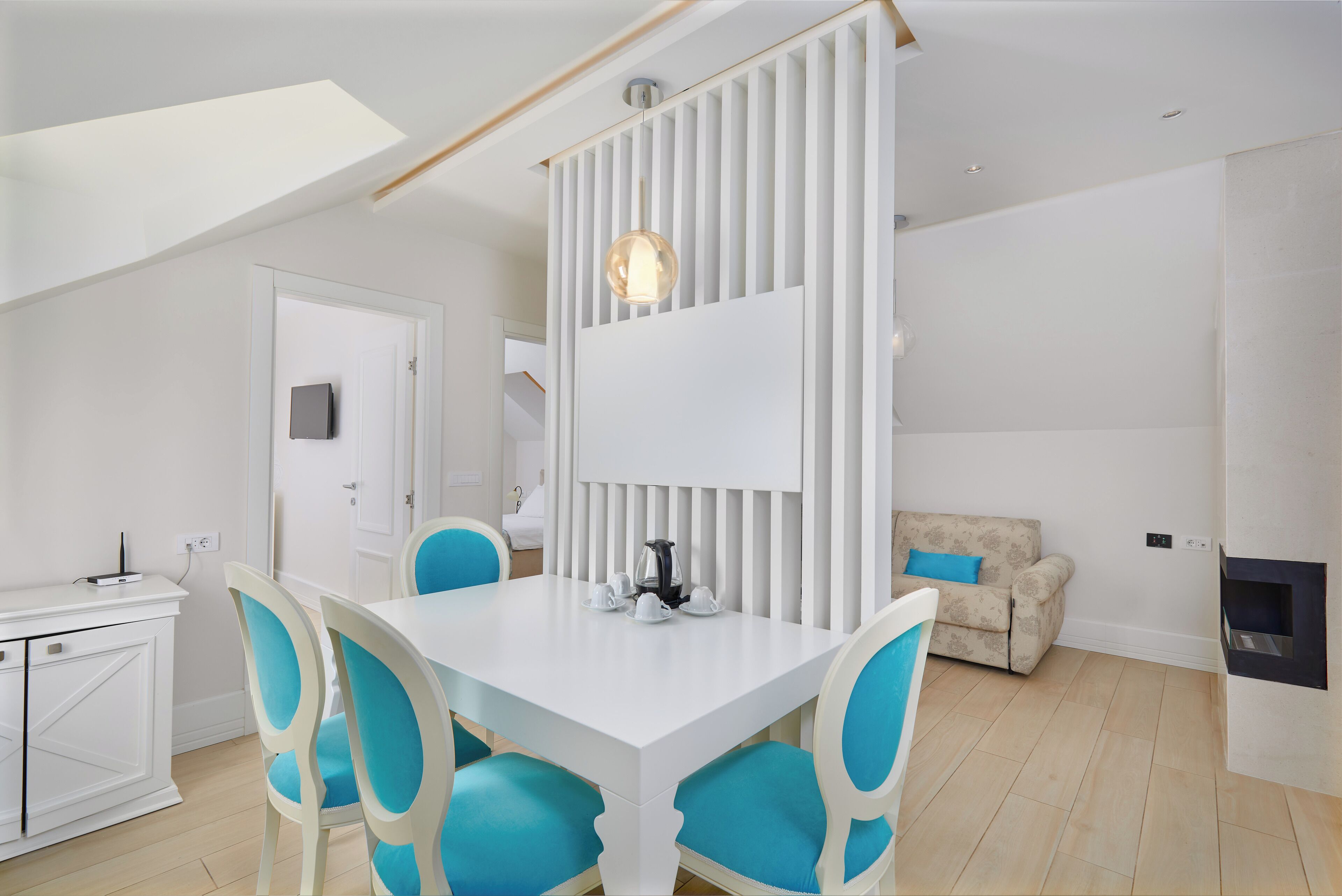 family apartment | living area | flat-screen tv, heated floors