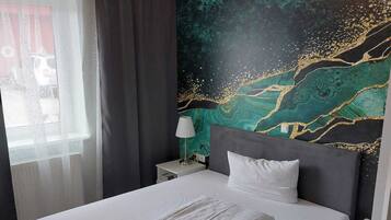In-room safe, desk, soundproofing, cribs (free)