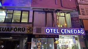 A multi-story building with several air conditioning units attached to the exterior. - Hotel Cenedag (Izmit)