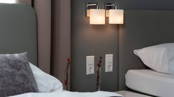 Premium bedding, desk, blackout drapes, soundproofing