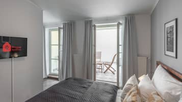 Apartment, 1 Bedroom, Terrace | In-room safe, desk, blackout curtains, iron/ironing board