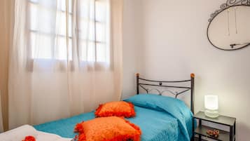 Apartamento, 2 quartos | 2 quartos, ferros/tábuas de passar roupa, berço de viagem