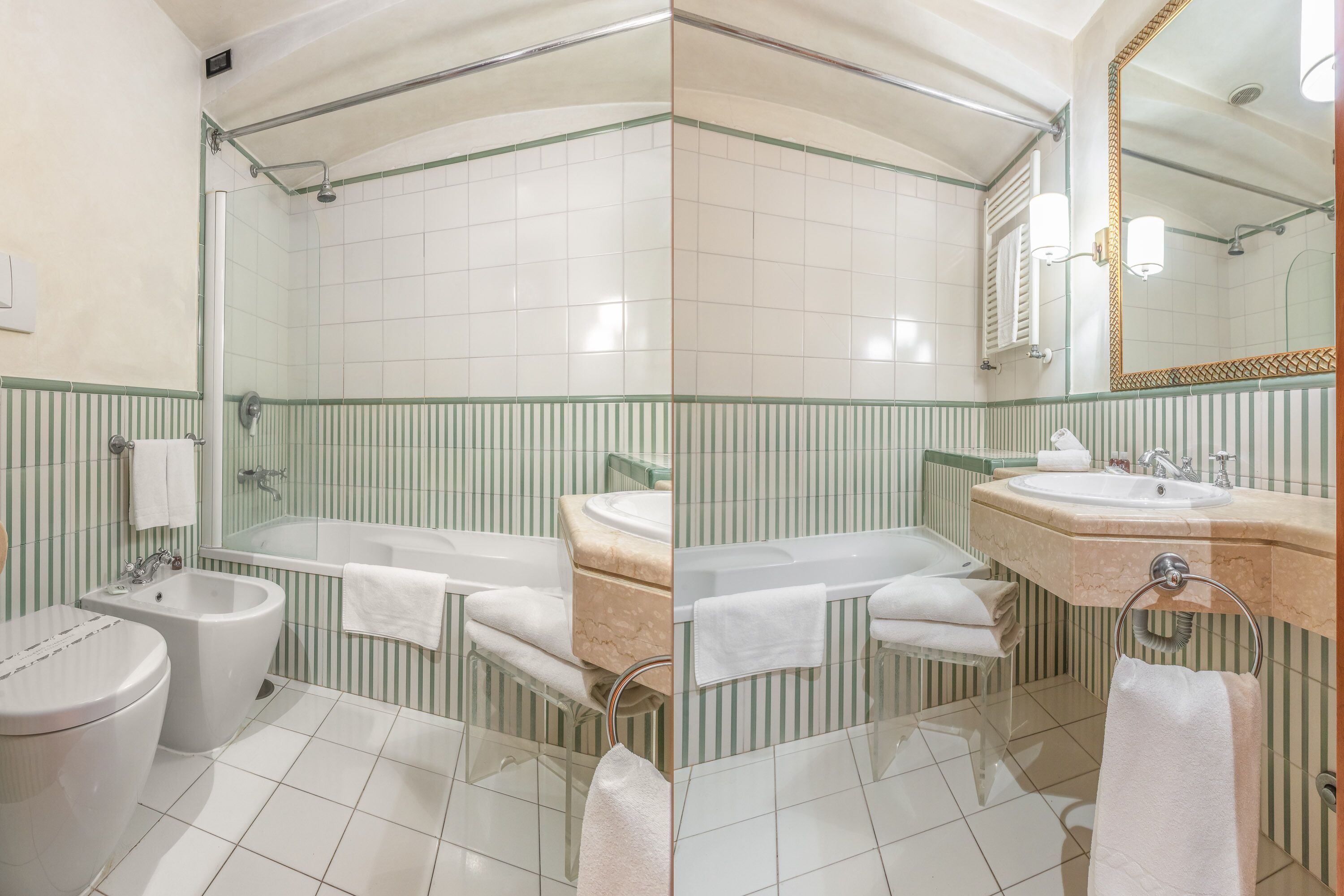 Un baño con bañera, lavamanos, bidé e inodoro.