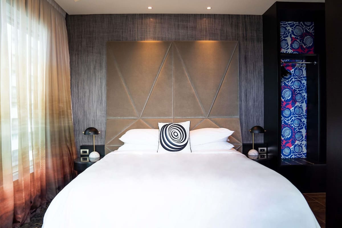 Loft Suite, Club Signature Access, 1 King Bed | 1 bedroom, premium bedding, minibar, in-room safe