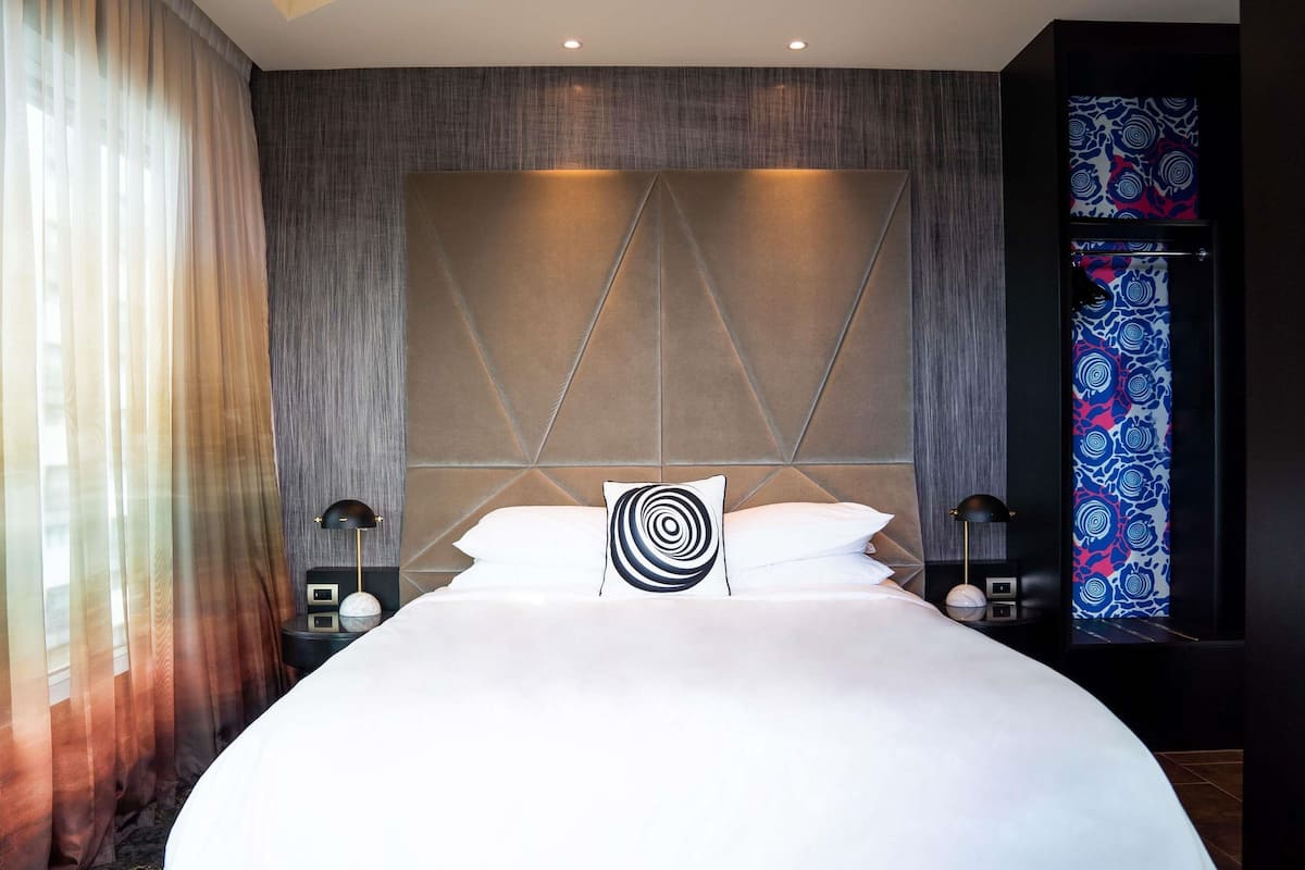 Loft Suite, Club Signature Access, 1 King Bed | 1 bedroom, premium bedding, minibar, in-room safe
