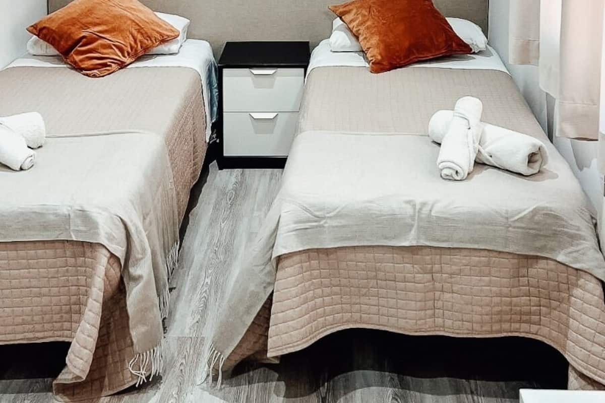 Chambre Familiale avec lits jumeaux