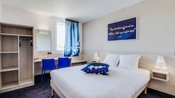 Tweepersoonskamer | Luxe beddengoed, Select Comfort-bedden, een kluis op de kamer