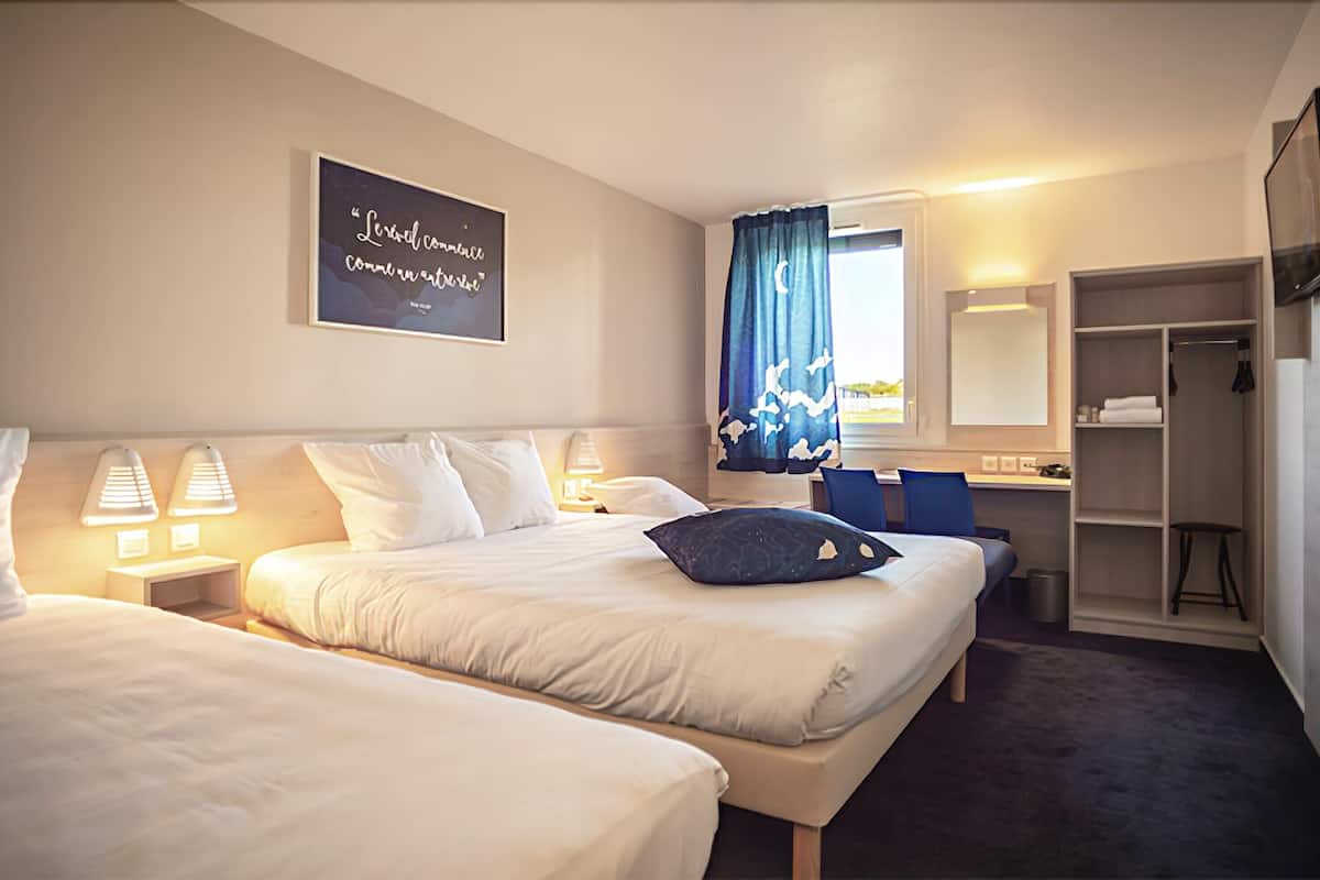 quadruple room | premium bedding, select comfort beds, in-room safe, desk