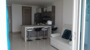 50-inch flat-screen TV with cable channels, TV - PALMETTO BEACH 1102 (Cartagena)