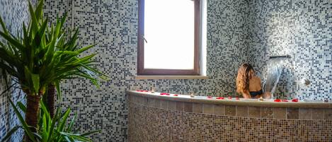 Hot tub, body treatments, body scrubs, facials, manicures and pedicures