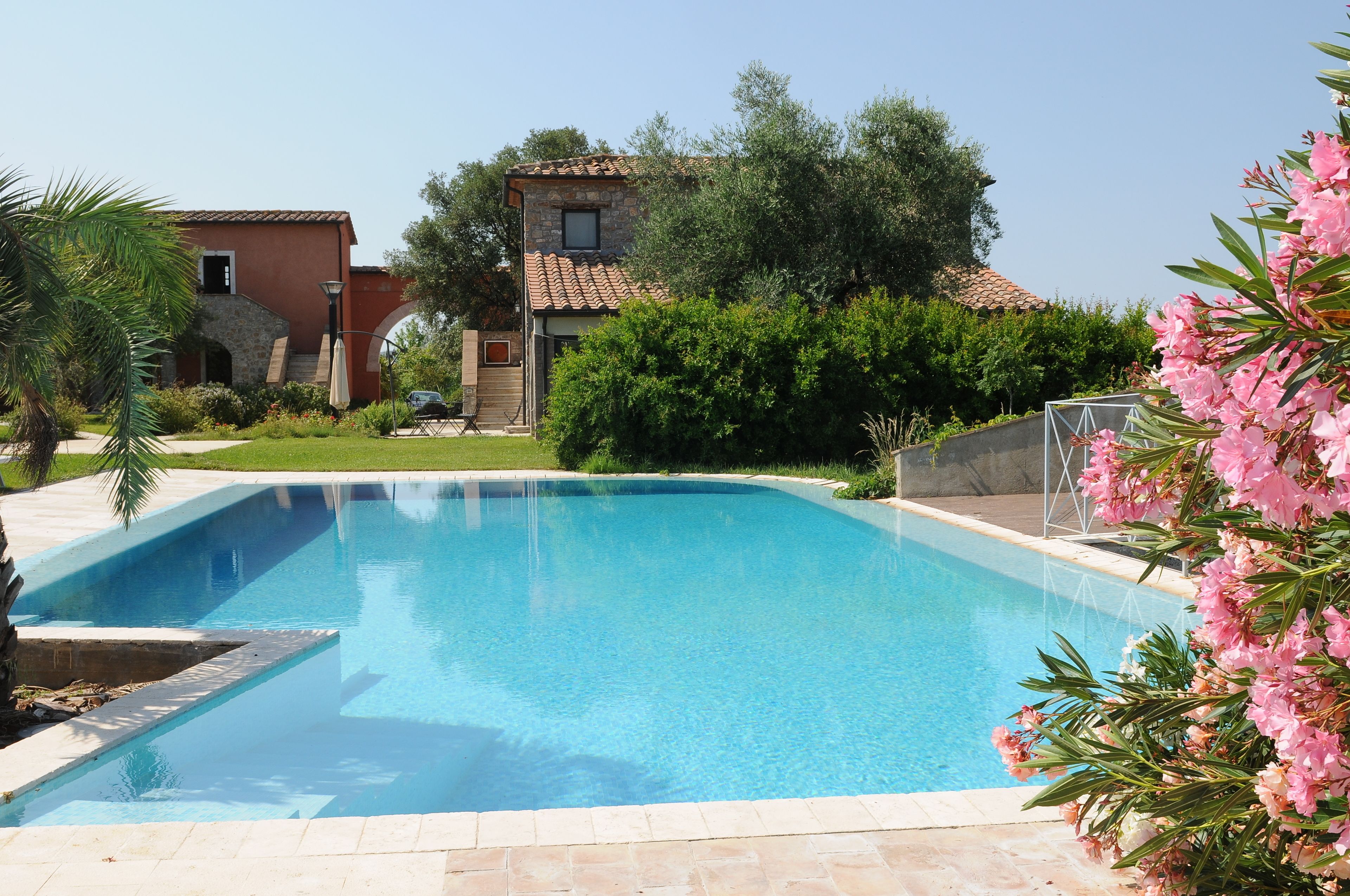 Seasonal outdoor pool, open 9 AM to 7 PM, pool loungers