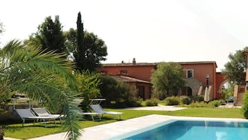 Seasonal outdoor pool, open 9 AM to 7 PM, sun loungers