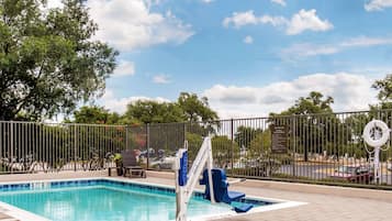 Outdoor pool, open 10:00 AM to 10:00 PM, sun loungers