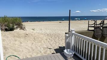 On the beach, sun loungers, beach towels