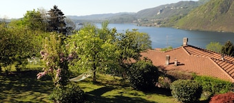 Orta See appartement in villa, grote tuin met uitzicht op het meer en het strand van Pettenasco