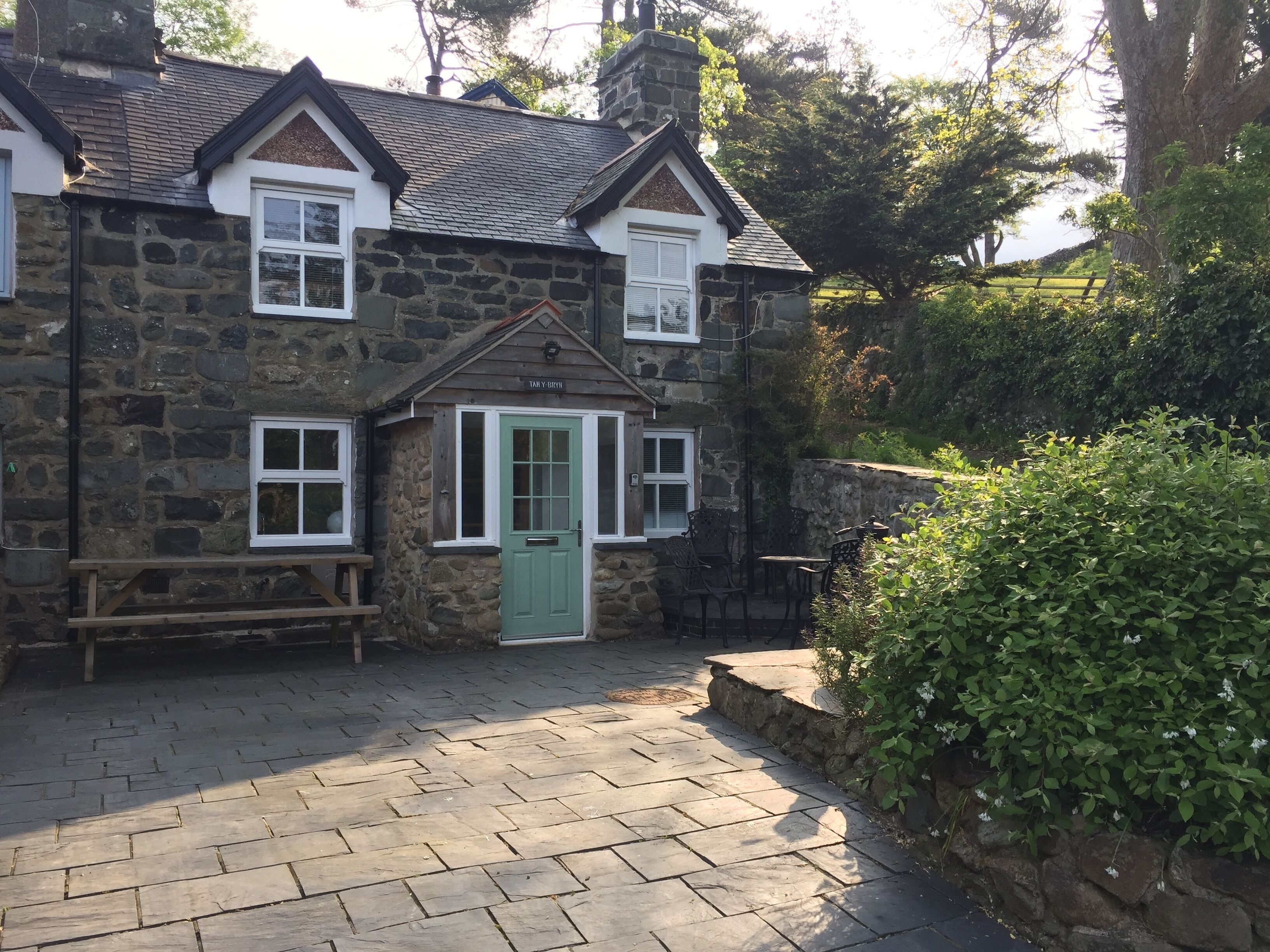 A fabulous stone cottage built in 1855, nestled in to the the hillside