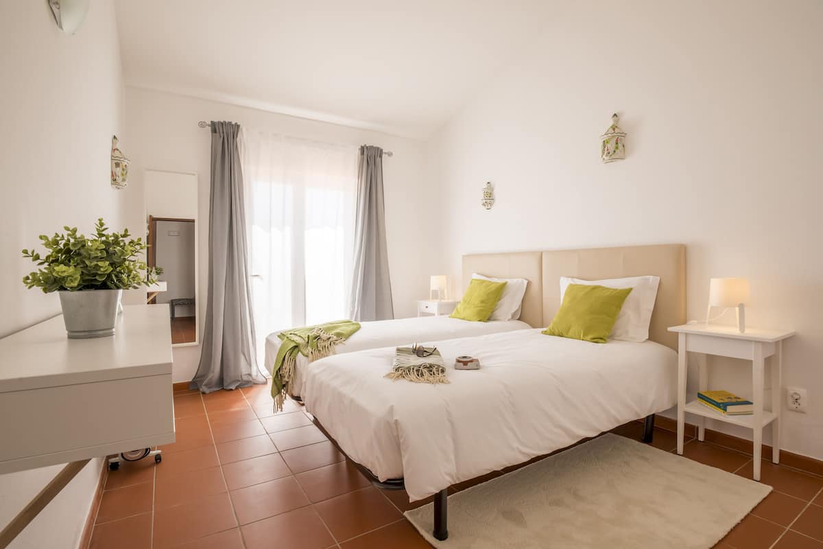 Deluxe Double or Twin Room, 1 Bedroom, Shared Bathroom, Pool View | 1 bedroom, iron/ironing board, bed sheets