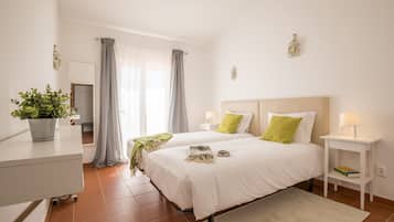 Deluxe Double or Twin Room, 1 Bedroom, Shared Bathroom, Pool View | 1 bedroom, iron/ironing board, bed sheets