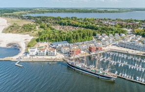 Enjoy waterfront views and a mix of modern and traditional architecture in this coastal town.