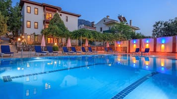 Outdoor pool, open 7:30 AM to 7:30 PM, pool umbrellas, pool loungers