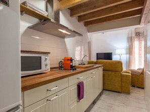 Fridge, microwave, coffee/tea maker, toaster