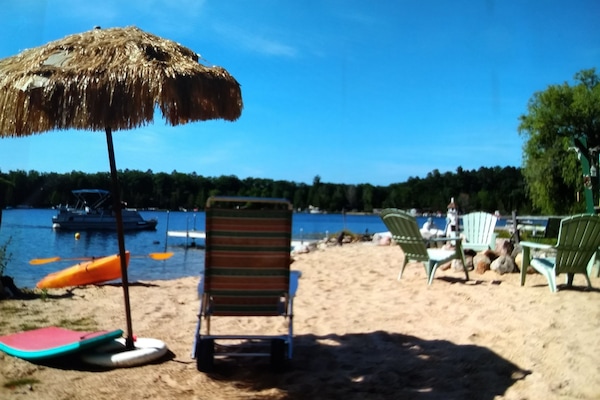 On the beach, sun loungers, beach towels