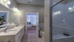 Separate tub and shower, deep soaking tub, towels