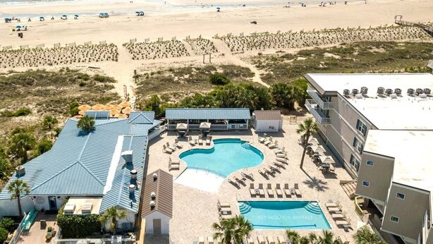 A resort with a pool, beach access, and a beachside view. - Tybee Beach Club 137 | Condo Overlooking Beach! (Tybee Island)