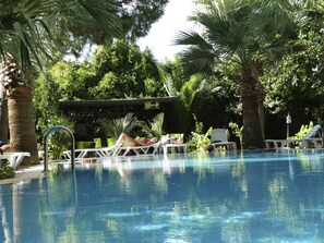 Outdoor pool, open 10:30 AM to 7:30 PM, pool umbrellas, sun loungers