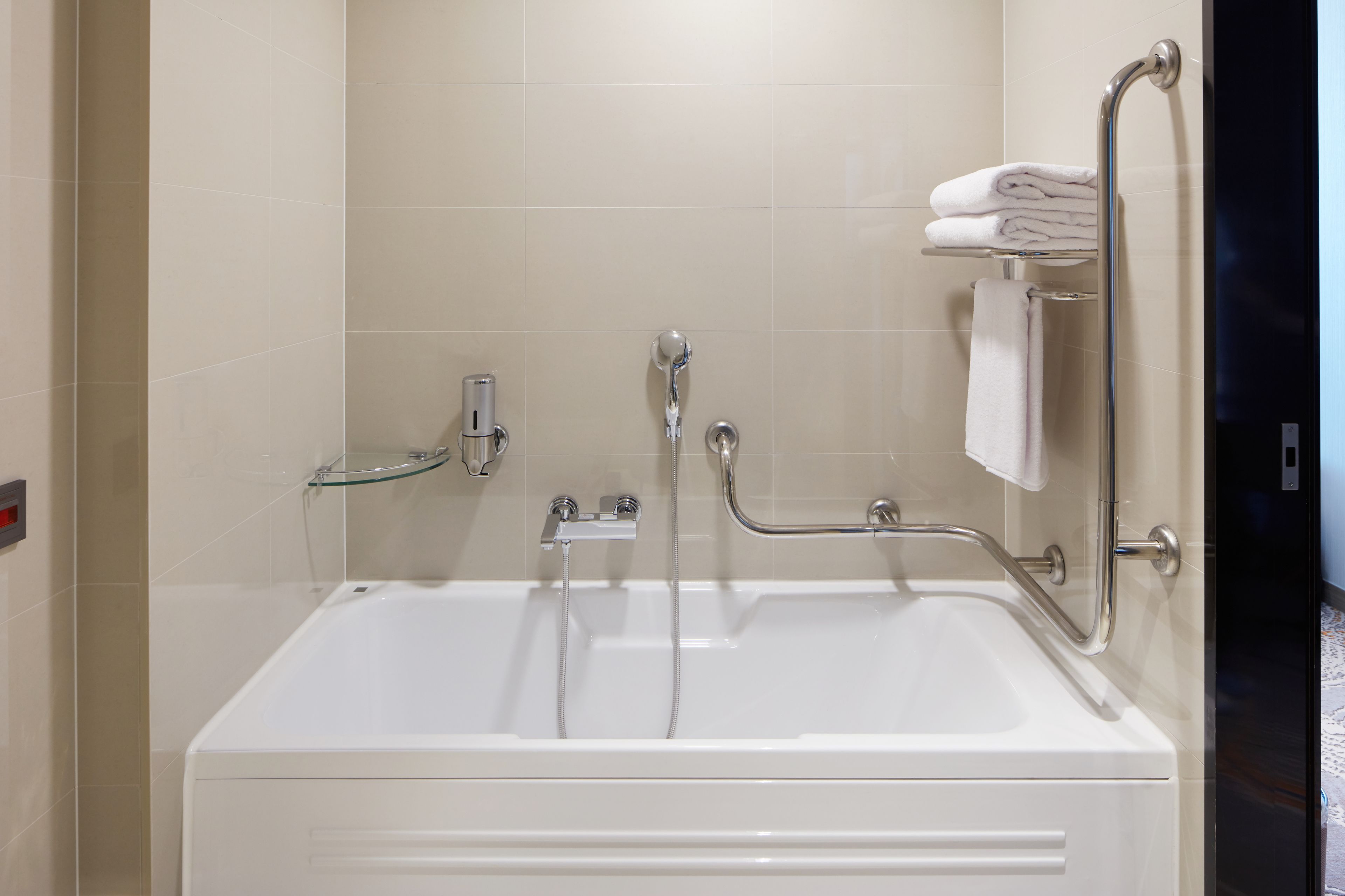 rainfall showerhead, hair dryer, bathrobes, slippers