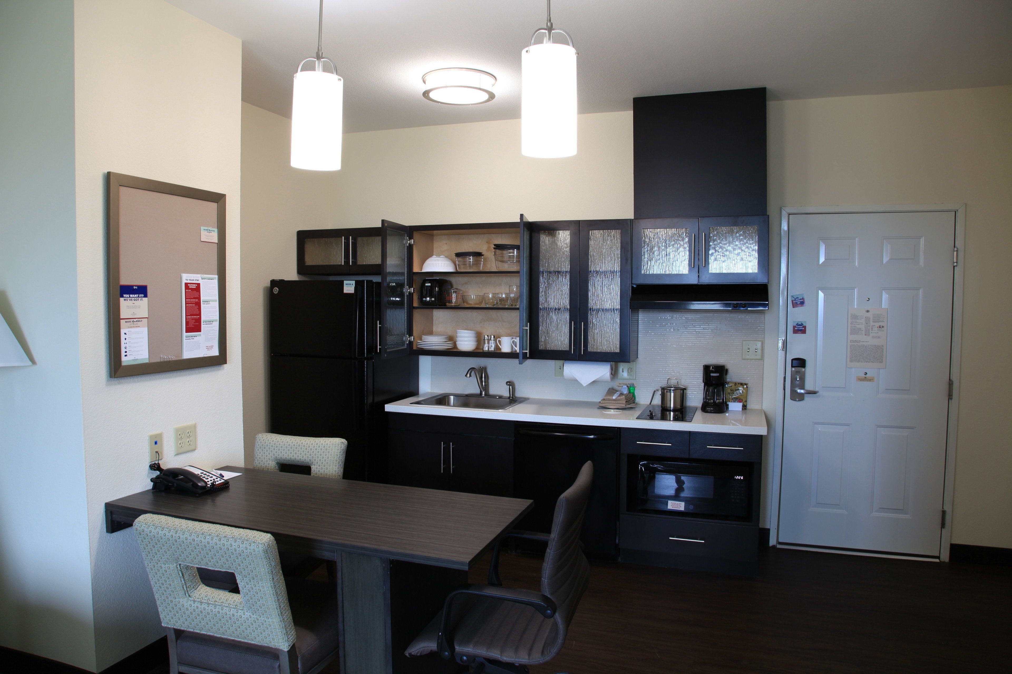 studio suite, multiple beds, accessible (communication, accessible tub) | private kitchen | full-sized fridge, microwave, stovetop, dishwasher