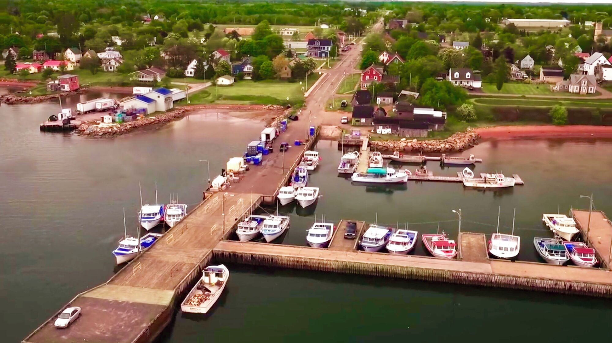 We are the gray house in the upper right corner overlooking the harbor