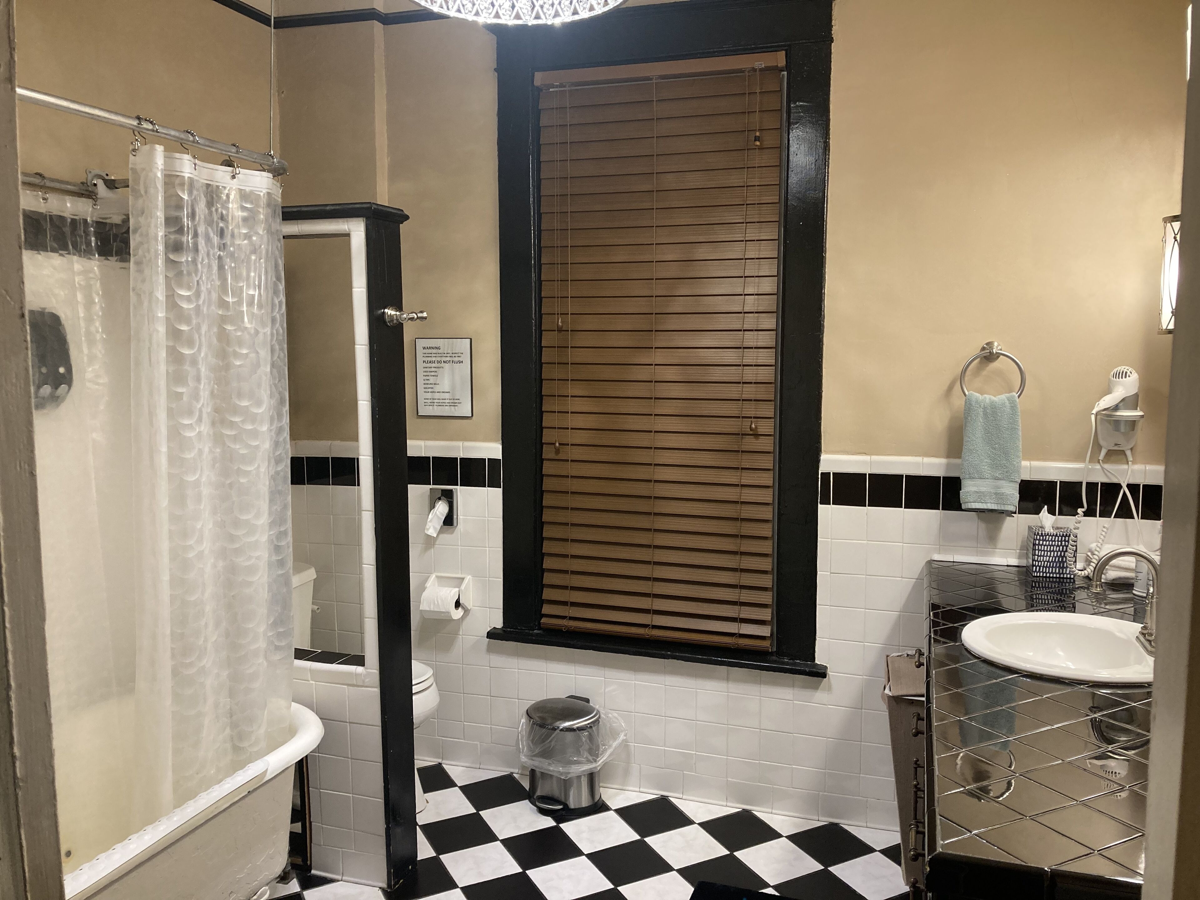 Bathtub, hair dryer, towels, soap