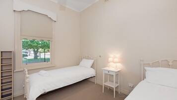 4 bedrooms, desk, iron/ironing board, travel cot