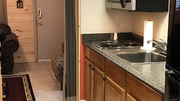 Fridge, microwave, stovetop, coffee/tea maker