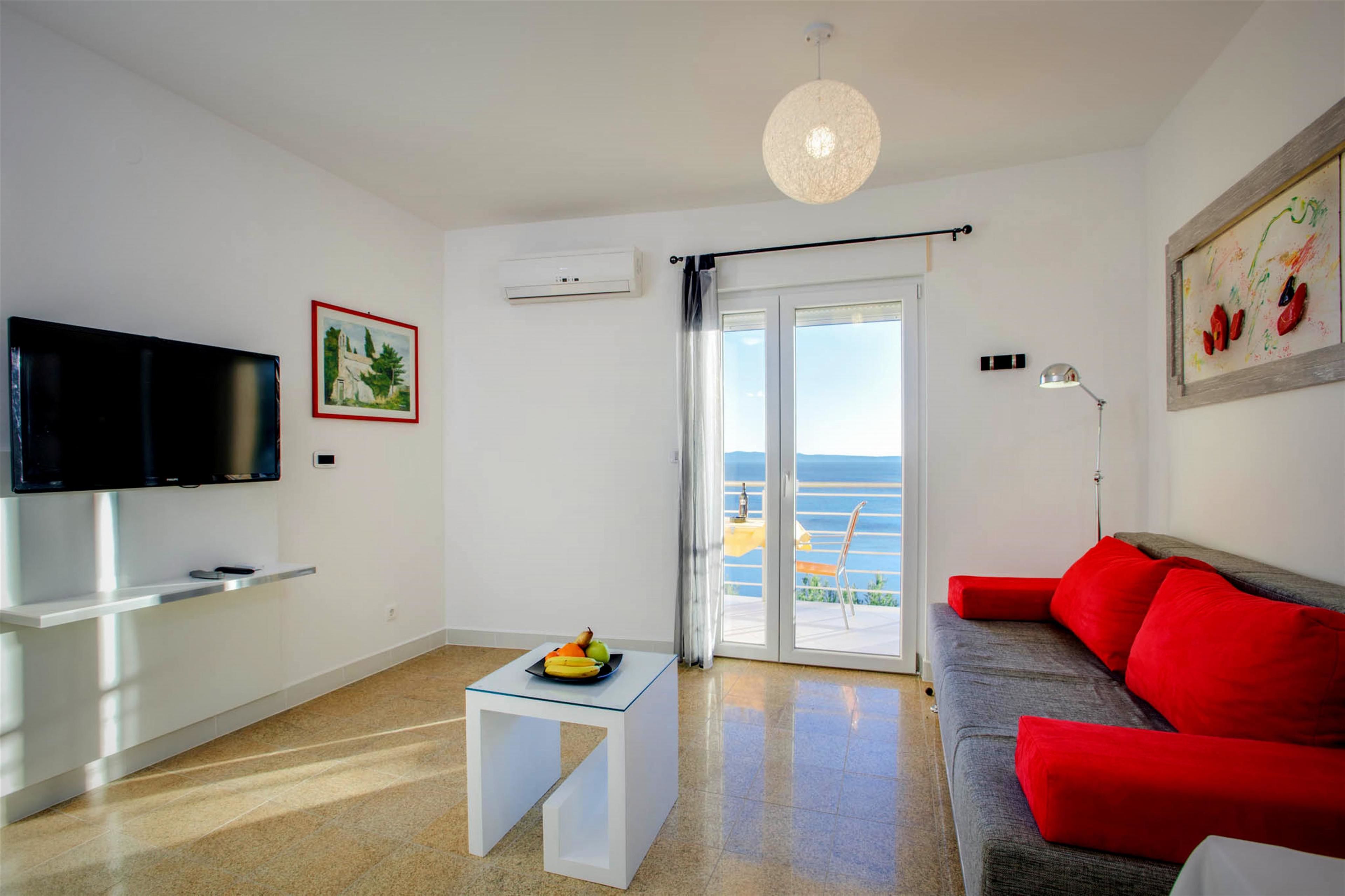 donkey. sea view apartment with panoramic balcony | living room | led tv
