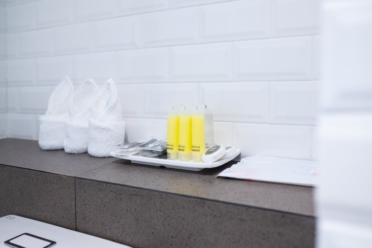 luxury triple room | bathroom | shower, rainfall showerhead, free toiletries, hair dryer