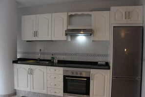 Fridge, microwave, oven, high chair