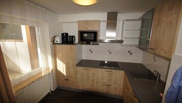 Apartment, 2 Bedrooms, Non Smoking, Mountainside | Private kitchen | Fridge, microwave, dishwasher, coffee/tea maker