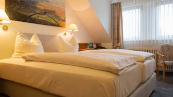 Ropa de cama de alta calidad y minibar