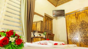 Premium bedding, free minibar items, in-room safe